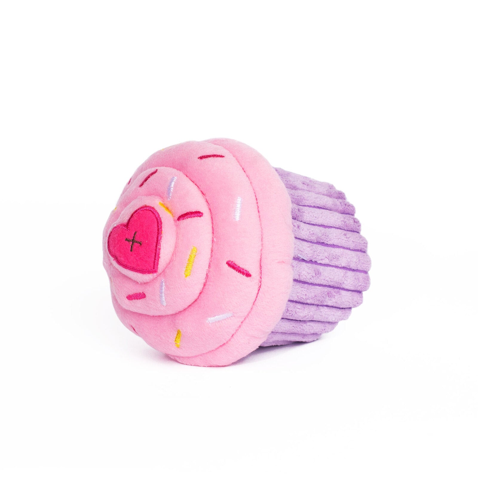 Pink cupcake dog toy with squeaker for playful dogs.