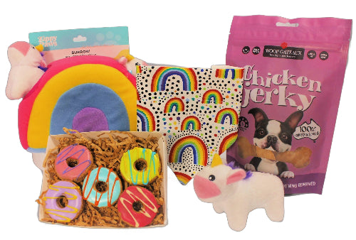 Rainbows & Unicorns Dog Gift Box with toys, treats, and a rainbow bandana.